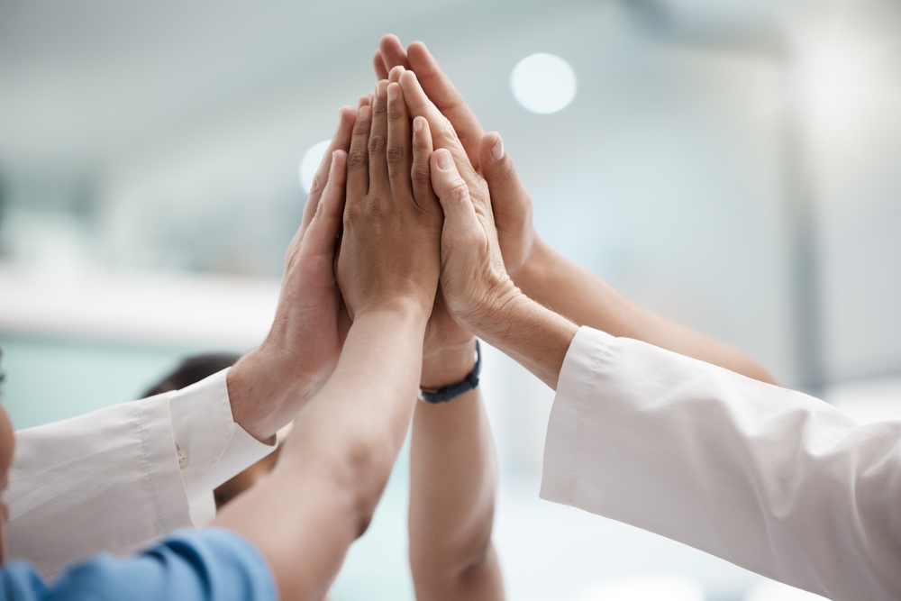 Doctors hands in collaboration